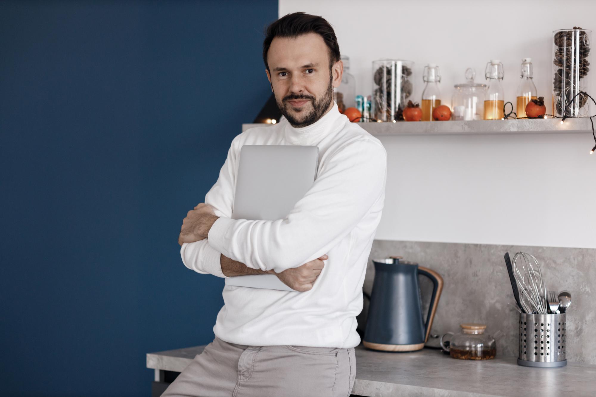Portrait of the founder chef in a quiet kitchen